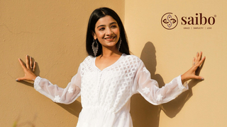 Woman in white chikankari kurti with delicate embroidery from Saibo’s summer ethnic wear collection